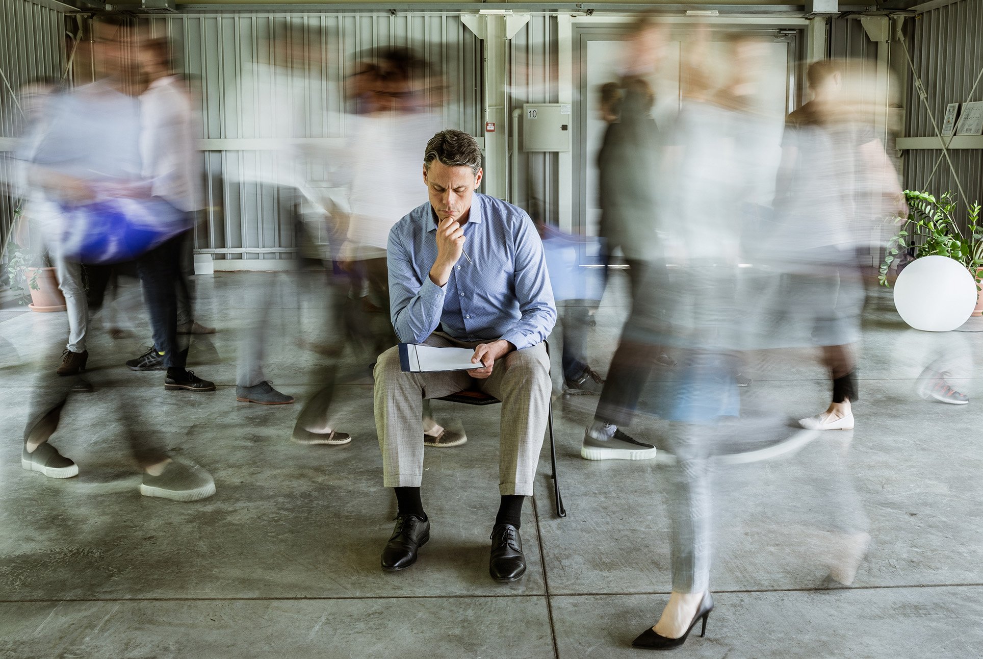 worker sitting in fast paced office